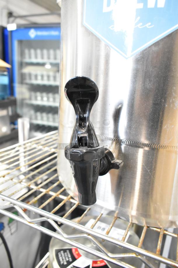 Curtis TC-7H Beverage Holder Dispenser, stainless steel, black spout, "Brew" label, excellent condition, on wire rack.