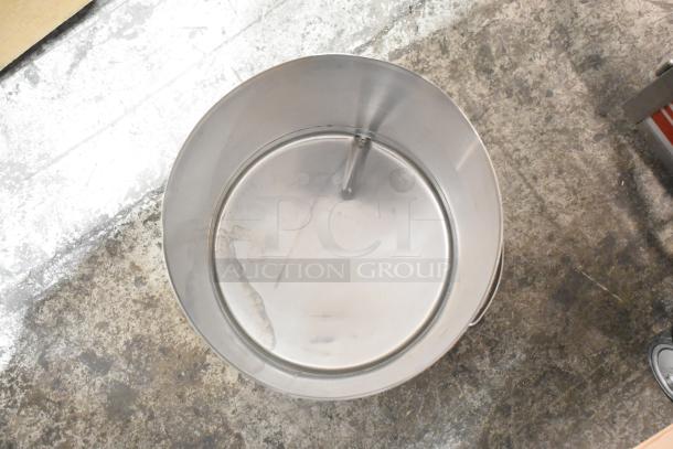 Curtis TC-7H Beverage Holder Dispenser, stainless steel, used condition, round shape, viewed from above.