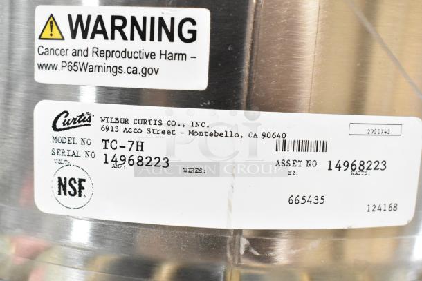 Curtis TC-7H Beverage Holder Dispenser, stainless steel, model and serial number 14968223, NSF certified, warning label attached.