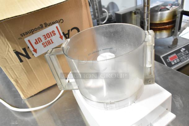 Cuisinart HandyPrep 3 Cup Food Processor, 120V, in used condition. Includes plastic bowl and base, shown with original box.