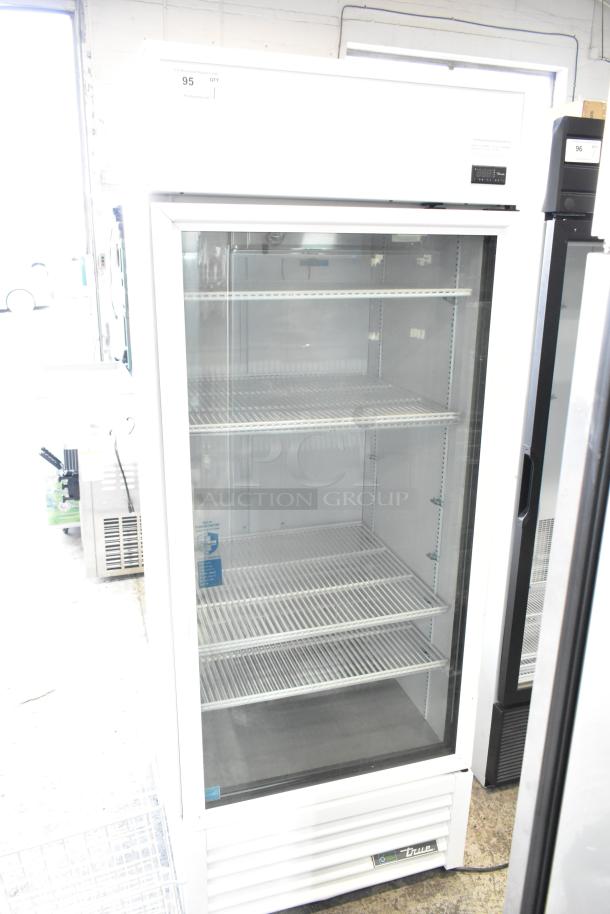 2021 True TSCI-600R-G-PH commercial single door cooler, glass front, 115V, excellent condition, multiple shelves.