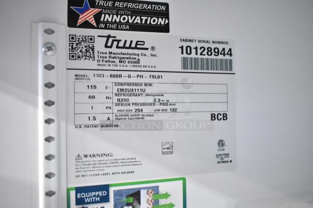 2021 True TSCI-600R-G-PH Reach-In Cooler, 115V, Model info label showing serial, refrigerant details, and certifications.