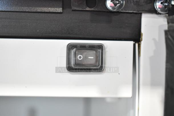 Switch detail of 2019 Habco SE18 Commercial Reach In Cooler Merchandiser, 115V, showing on/off control.