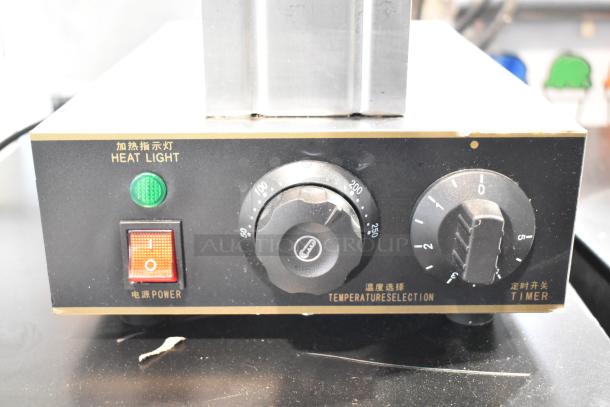 2019 WZ-DZ(D)-GB Commercial Countertop Waffle Bites Maker, 110V, front panel with heat light, power switch, temp, and timer dials.
