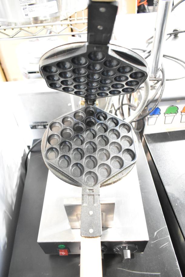 2019 WZ-DZ(D)-GB Commercial Countertop Waffle Bites Maker, 110V, 1 Phase, round plates, black finish, good condition.