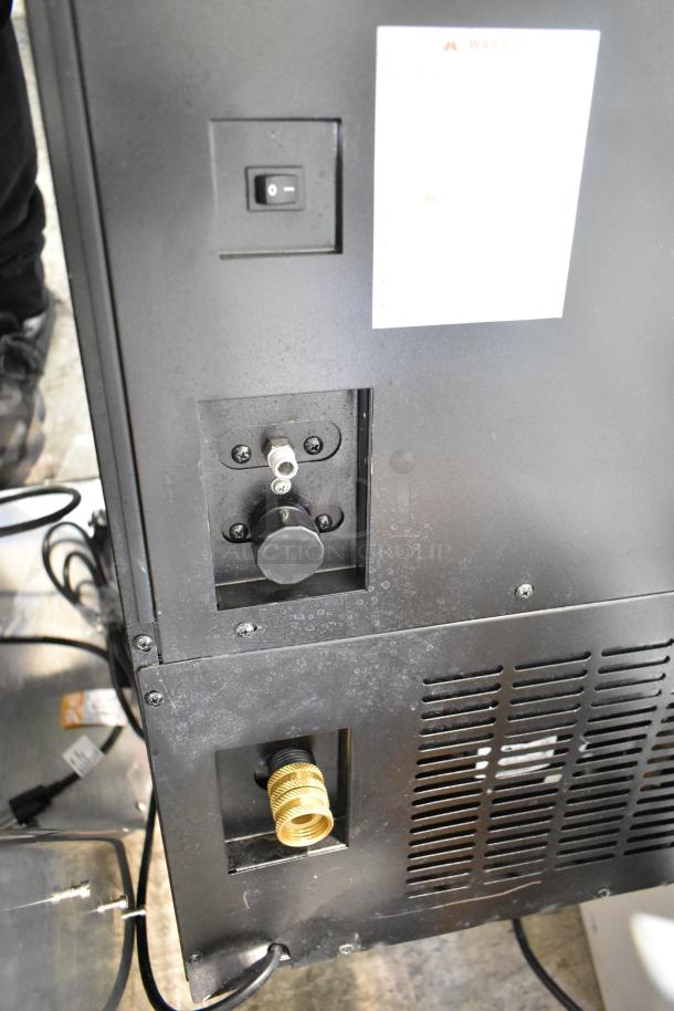 Danby DIM32D1BSSPR undercounter ice maker back view with power switch, drainage connection, and vent. 32 lbs. daily ice production.