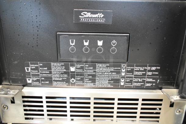 Danby DIM32D1BSSPR ice maker controls, showing cube size options and indicator lights. Silhouette logo visible on panel.