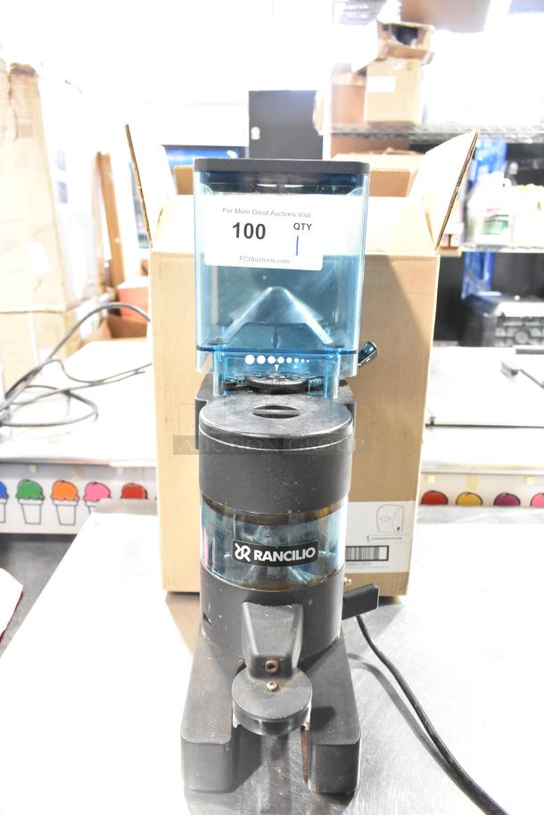 Rancilio MD 50/AT commercial espresso grinder, 110V, used condition, with Rancilio branding and hopper label visible.