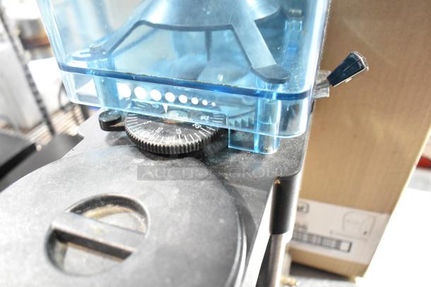 Rancilio MD 50/AT commercial espresso bean grinder, 110V, adjustable settings, blue hopper, good condition.