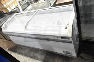 Dukers WD-700Y Commercial Chest Freezer, 115V, 1 Phase; features glass sliding doors, visible Dukers logo, good condition.