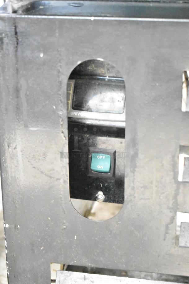 Master-Bilt BGR-15 cooler detail, shows on/off switch. Commercial single-door model. 115 volts, 1 phase. Visible wear.