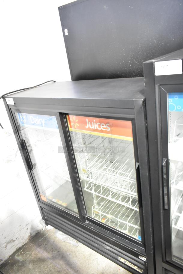 True GDM-41SL-54-LD commercial cooler, double glass doors, shelving inside, labels for dairy and juices, 115 volts, 1 phase.