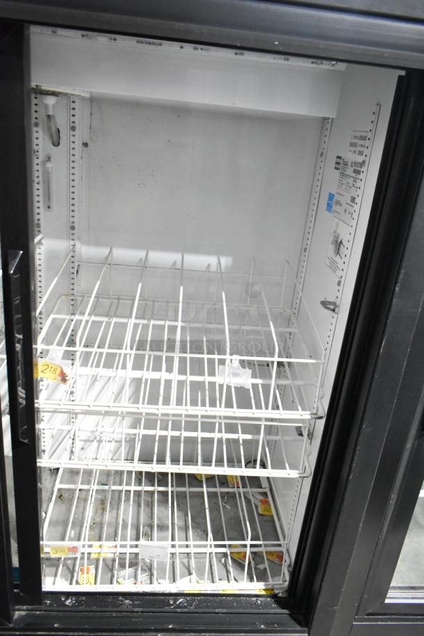 True GDM-41SL-54-LD 2-door cooler merchandiser, 115V, excellent for commercial use, interior shelving, clean condition.