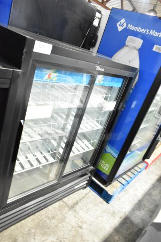 True GDM-41SL-60-HC-LD 2 Door Cooler Merchandiser, black finish, glass doors, shelving, 115V, commercial use.