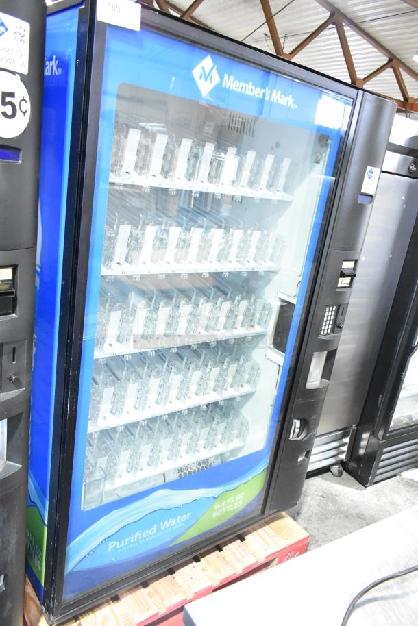 Crane 5800-4 metal vending machine for bottled drinks, includes bill acceptor, 115 volts, 1 phase, excellent condition.