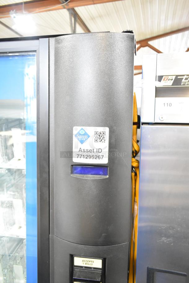 Crane 5800-4 metal vending machine with bill acceptor, 115V, 1 Phase. Asset ID label: 771295267. Accepts $1 bills.