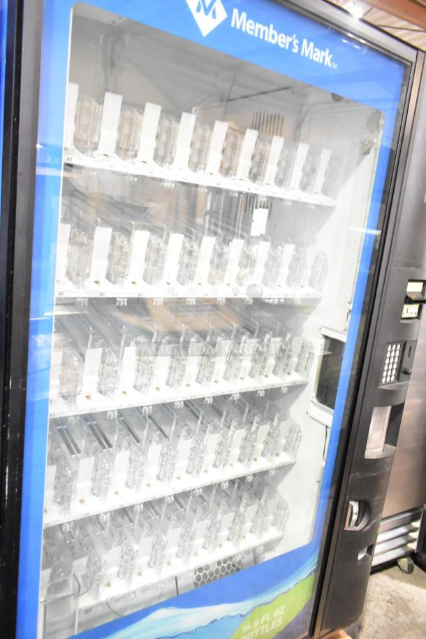 Crane 5800-4 metal commercial drink vending machine with bill acceptor, 115 volts, excellent condition, empty slots visible.