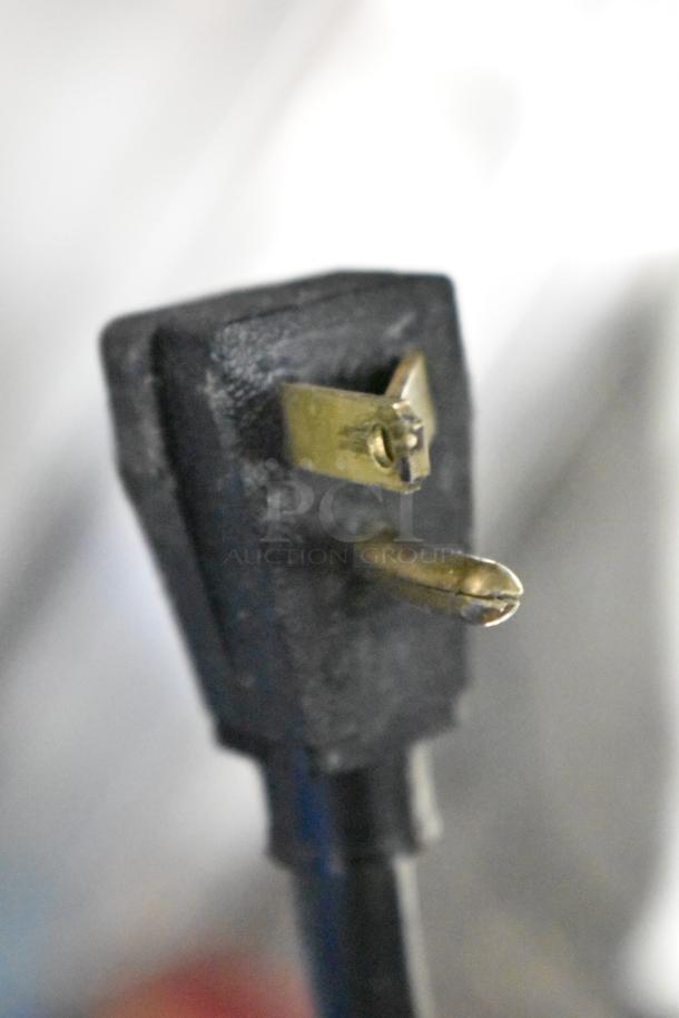Close-up of the electrical plug for a 2016 True T-19F commercial single door reach-in freezer, 115 volts, 1 phase.