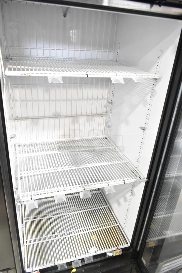 2019 True GDM-26F-HC cooler merchandiser, single door, white wire shelves, 115V, used condition, spacious interior.