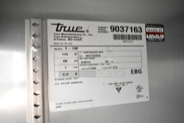 2016 True T-19F Commercial Freezer label showing model details: 115 volts, 60 Hz, 1 phase, R404A refrigerant, Made in USA.