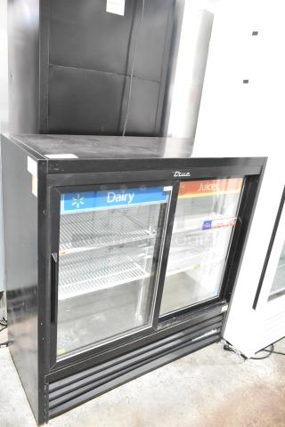 True GDM-41SL-48-HC-LD commercial 2-door reach-in cooler merchandiser, 115V, 1 phase, with glass doors and shelving.
