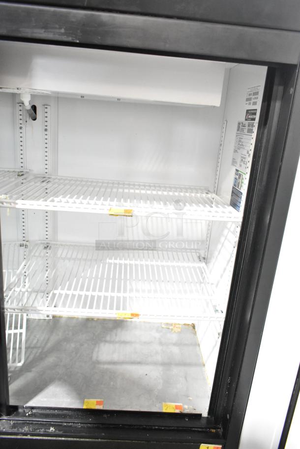 True GDM-41SL-48-HC-LD 2-Door Cooler Merchandiser, white interior, three wire shelves, visible labels, 115V, 1 Phase.
