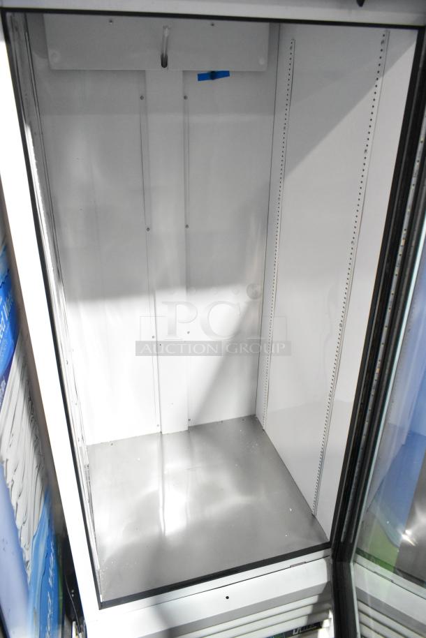2021 True TSCI-600R-G-PH commercial single door reach-in cooler merchandiser, 115V, 1 phase, pristine condition.