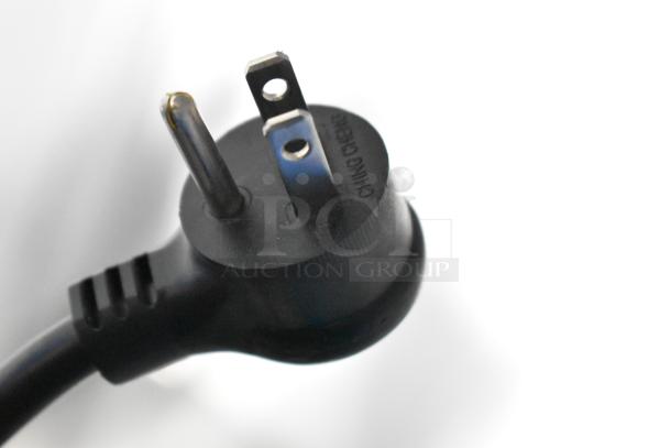 Close-up of a black power plug for a True TSCI-600R-G-PH cooler, showing three prongs and marked "CHING CHER."
