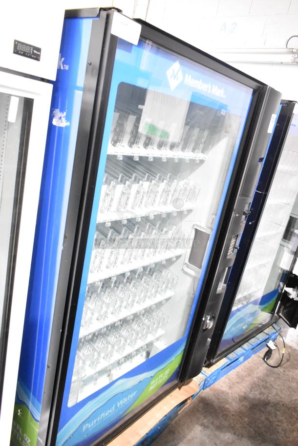 Crane 5800-4 metal commercial drink vending machine with bill acceptor, blue and black exterior, 115 volts, 1 phase.