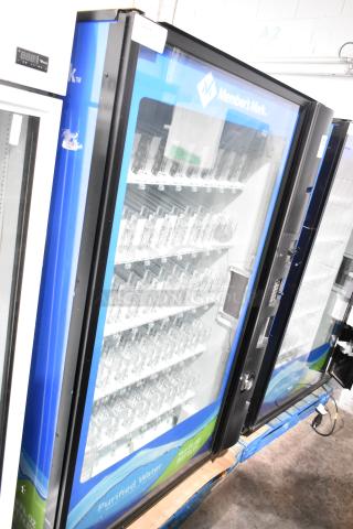 Crane 5800-4 metal commercial drink vending machine with bill acceptor, blue and black exterior, 115 volts, 1 phase.