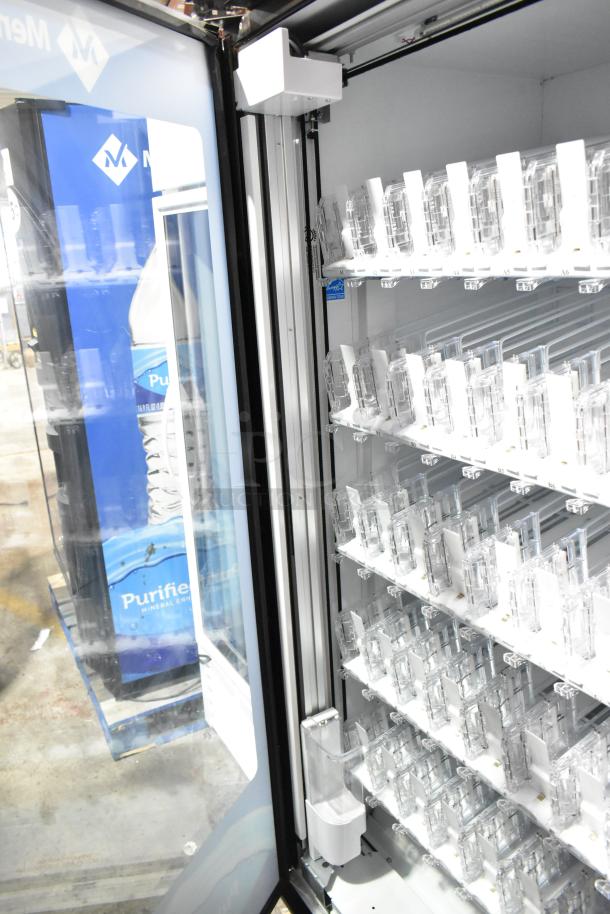 Crane 5800-4 commercial drink vending machine, metal, with bill acceptor, 115 volts, 1 phase. Open showing empty slots.