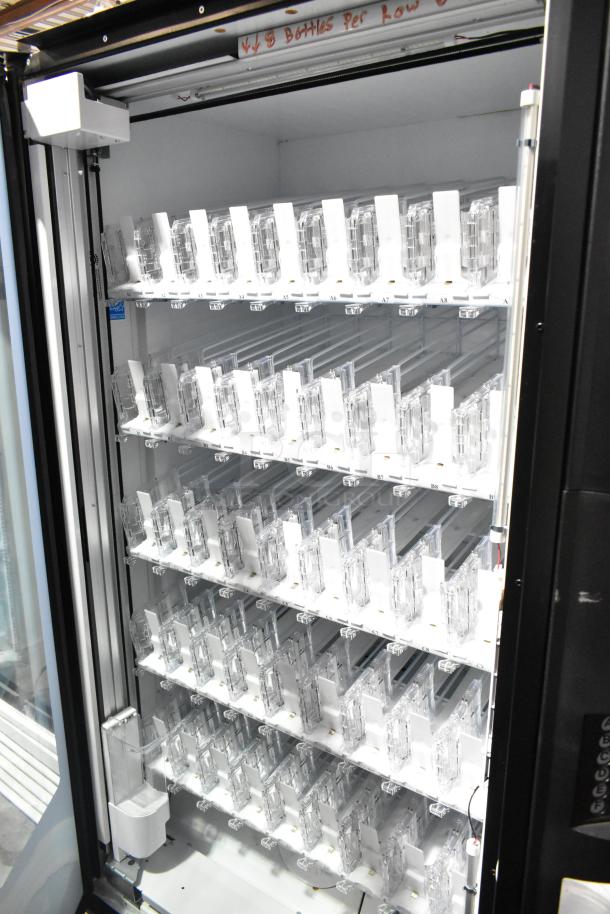 Crane 5800-4 metal vending machine for bottled drinks with bill acceptor, 115 volts, 1 phase, excellent condition.