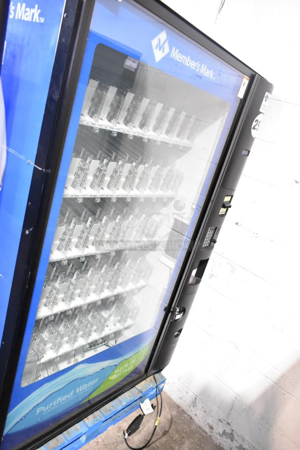 Crane 5800-4 metal commercial vending machine, bill acceptor, 115V, 1 phase, good condition, holds bottled drinks.