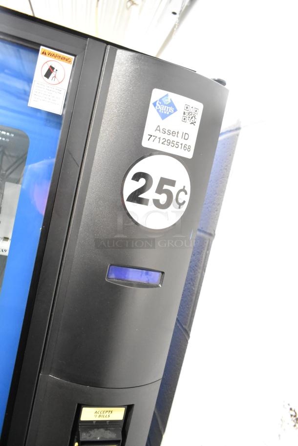 Crane 5800-4 commercial vending machine, accepts bills, metal construction, 115V, 1 phase, 25¢ price tag, asset ID visible.