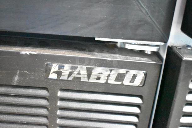 Habco SE12 commercial single-door cooler merchandiser, 115 volts, 1 phase, visible brand logo, black finish.