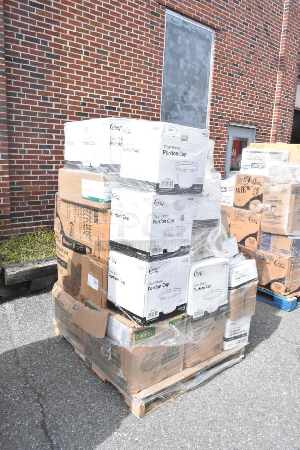 Pallet with brand new scratch and dent items, including Choice clear plastic portion cups in sealed boxes.