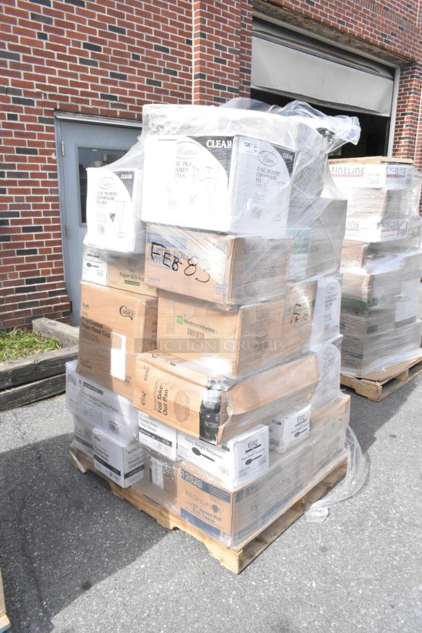 Pallet of 36 new scratch and dent items wrapped, including boxes of champagne flutes, cups, and other containers.