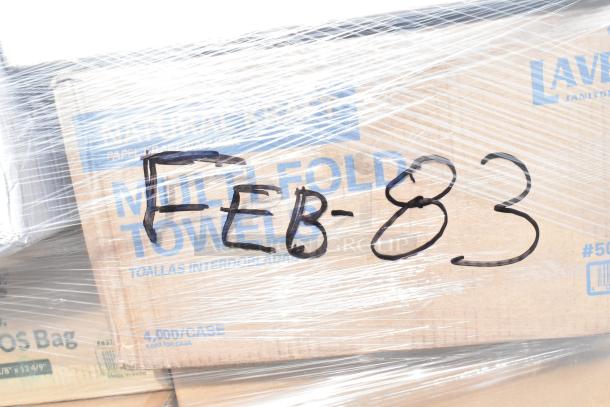 Box labeled "FEB-83" with wrapped multi-fold towels visible, part of 36 brand new scratch and dent items.