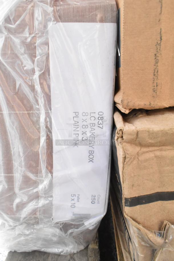 Pack of 24 scratch and dent items including LC Bakery Boxes; labeled 0837, 8x8x3 inches, plain pink, count 250.