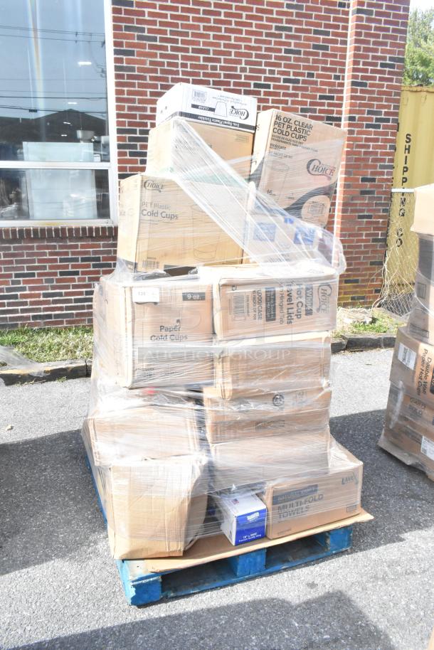 Pallet of 29 new scratch and dent items including placemats, towels, cold cups, and containers, wrapped in plastic.