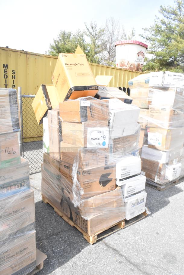 Stack of 32 boxed items on pallet, including trays, gloves, containers, and platters. Labeled "PCI MAR26-19 876."
