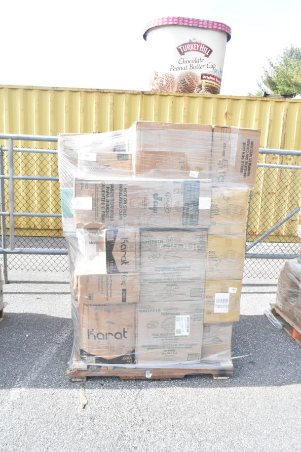 Pallet with 37 new scratch and dent items including Karat bags and Dart foam cups, wrapped in plastic, ready for auction.