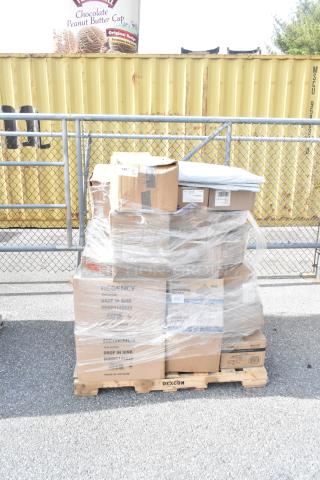 Pallet of new items including teaspoons, cutting board, soup crocks, steam pans. Boxes wrapped in plastic. Marked Regency.