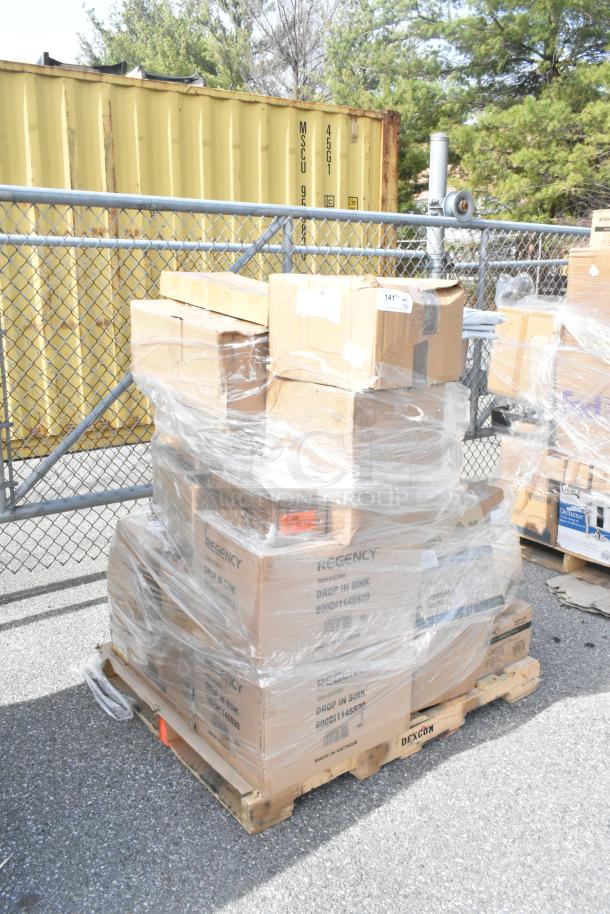 Pallet of boxed kitchenware, including unused items like teaspoons, cutting board, soup crocks, and steam pans.