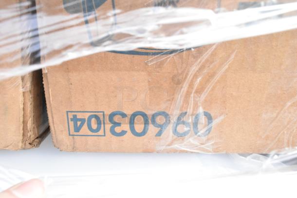 Cardboard box labeled "0960304," containing 32 scratch and dent items, including a salad spinner and glasses.