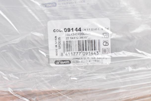 Label showing Araven container details: Code 09144, 22.65 L, 565x340x200mm. Made in Spain. Barcode and care icons visible.