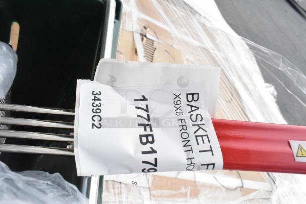 28 new scratch and dent items, including an ice scoop, pallet jack handle, and ice bin lid. Tag shows "BASKET F X9x6".