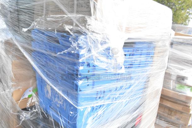 Plastic-wrapped pallet with blue crates and various new scratch and dent items including an ice scoop and pallet jack handle.