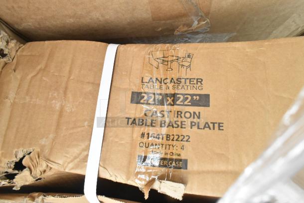 Lancaster 22" x 22" cast iron table base plate box, showing scratches and dents. Marked with model #154TB2222, quantity 4.