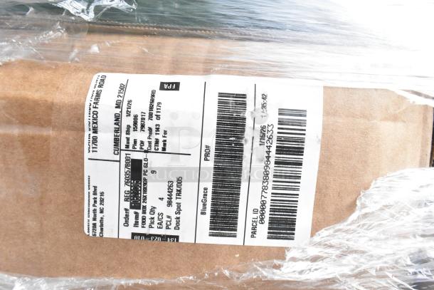 28 new scratch and dent items wrapped on a pallet. Visible label includes shipping info and barcode.